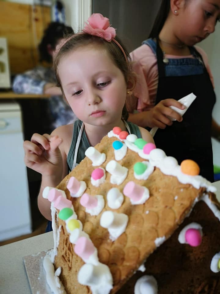 A little chef busy decorating