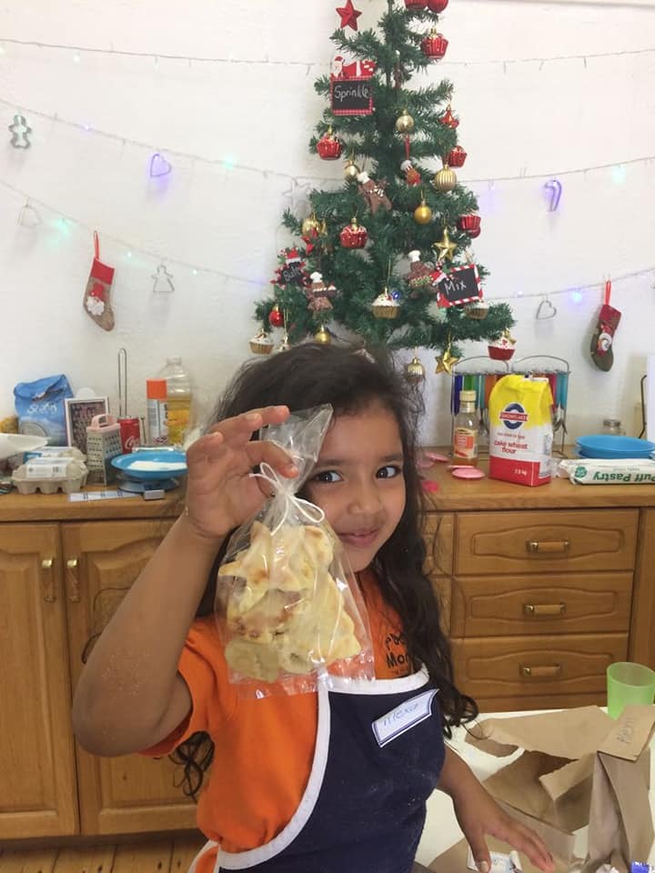 Children baking together at Pikanini Chefs