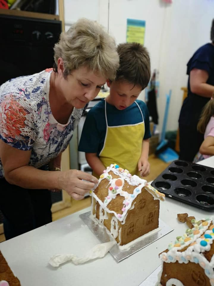 Kids cooking and baking together